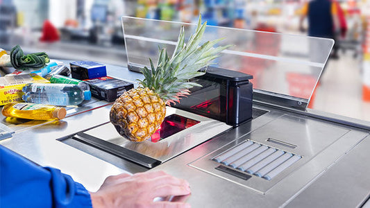 Datalogic Magellan 9550i bi-optic in-counter scanner (957022201-00312) – in use at a staffed checkout